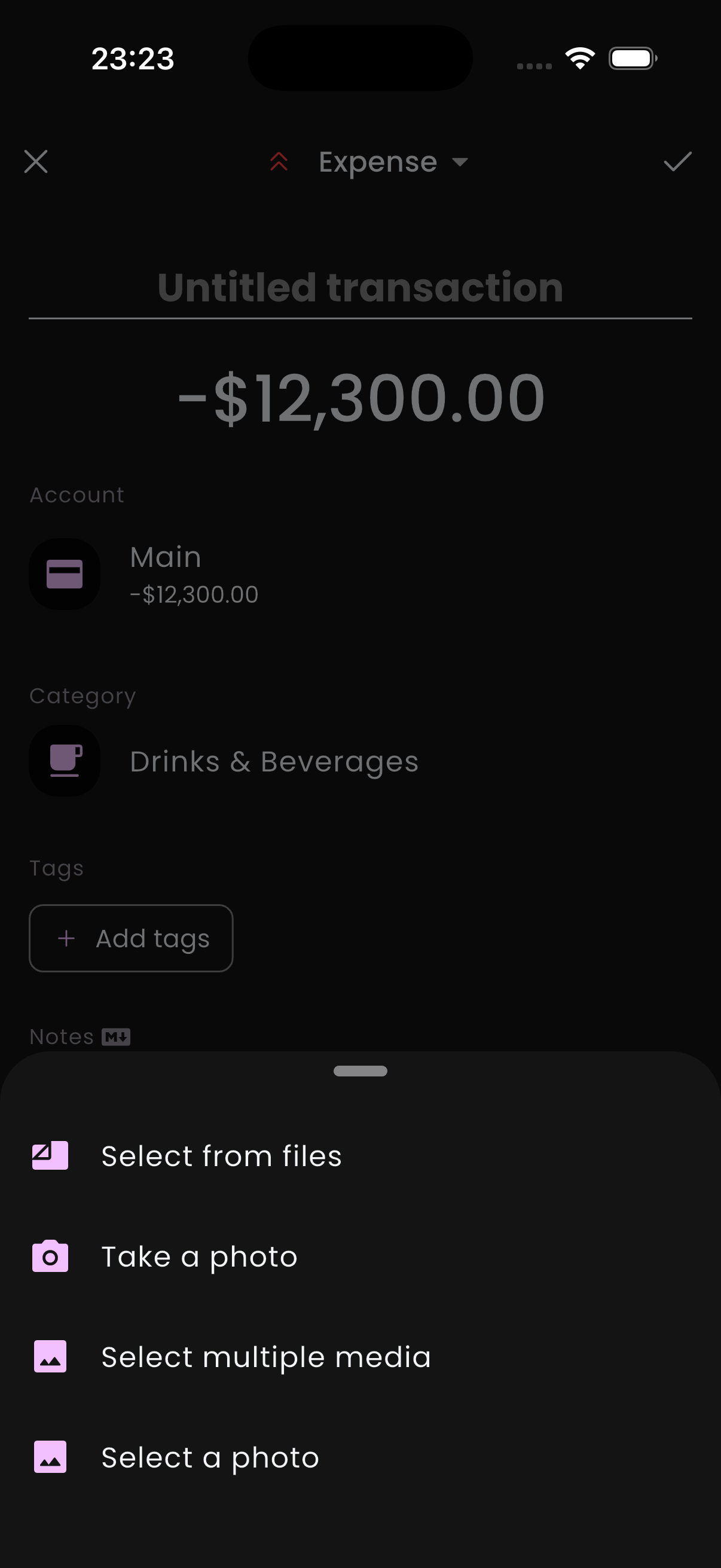 The attachments section of the transaction page with an add-photo button.